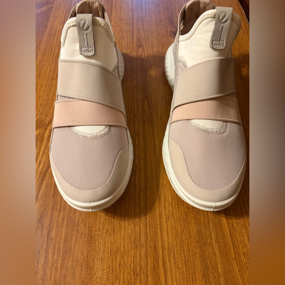 Ecco S. T. 1 White and Cream Slip-On Casual Sneakers w/ blush accent strap.